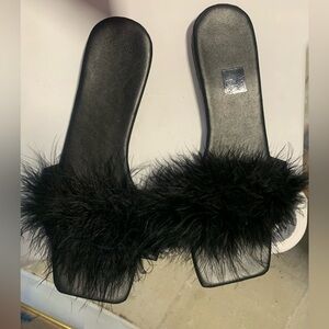 Women’s black slippers